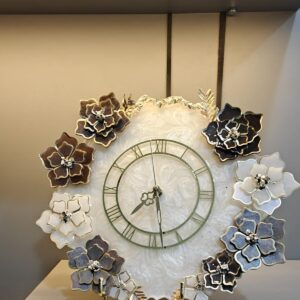 Elegant handcrafted floral resin wall clock with Roman numerals, jewel accents, and golden detailing, perfect for home or office decor.