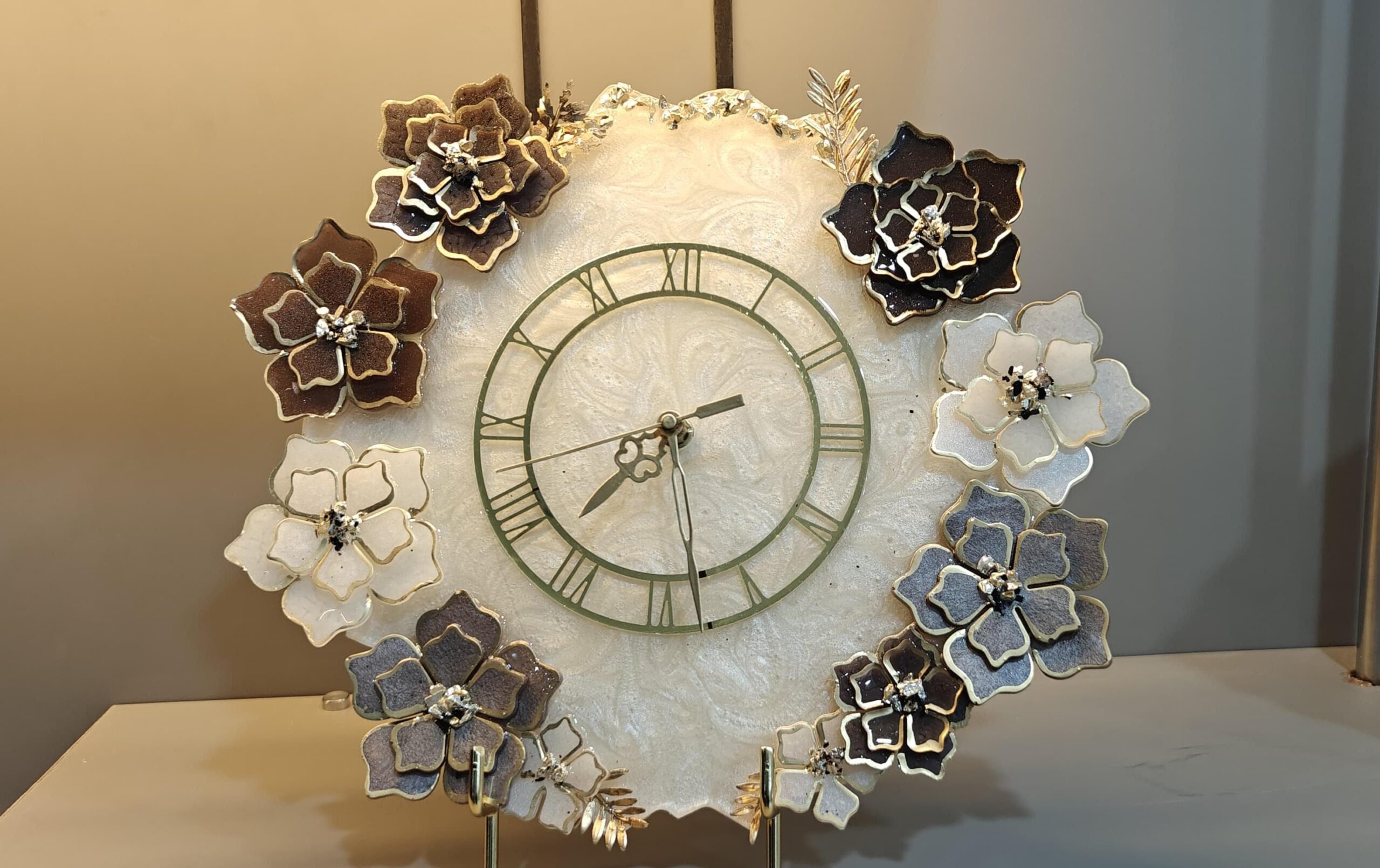 Elegant handcrafted floral resin wall clock with Roman numerals, jewel accents, and golden detailing, perfect for home or office decor.